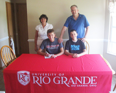 Hilliard Darby High School's Lane Hagar poses with his family after signing to continue his career at Rio Grande